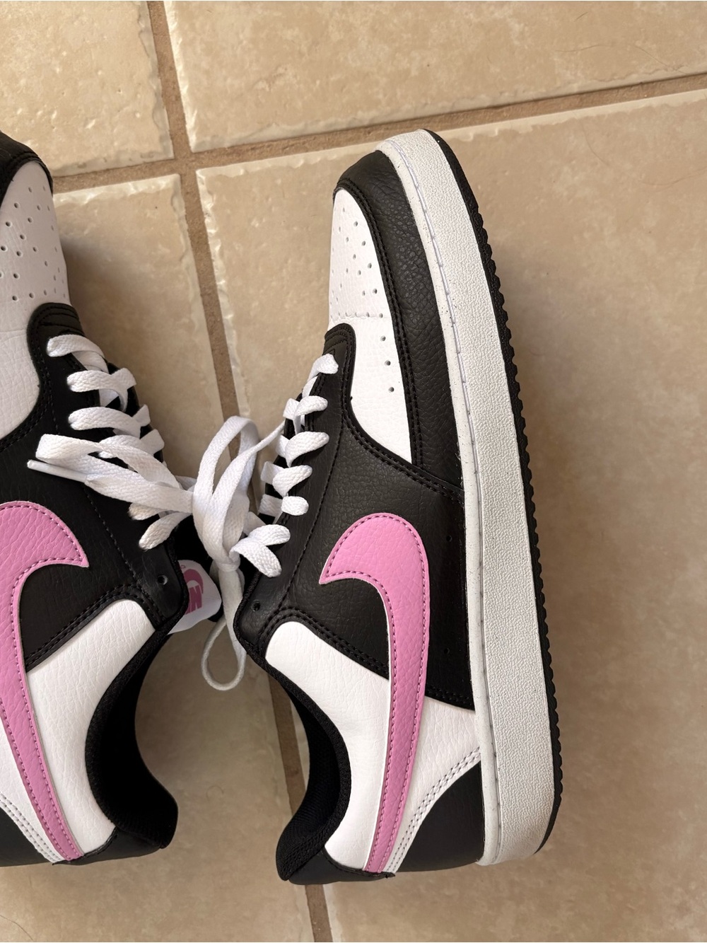 Nike Womenās Court Vision Low Sneakers